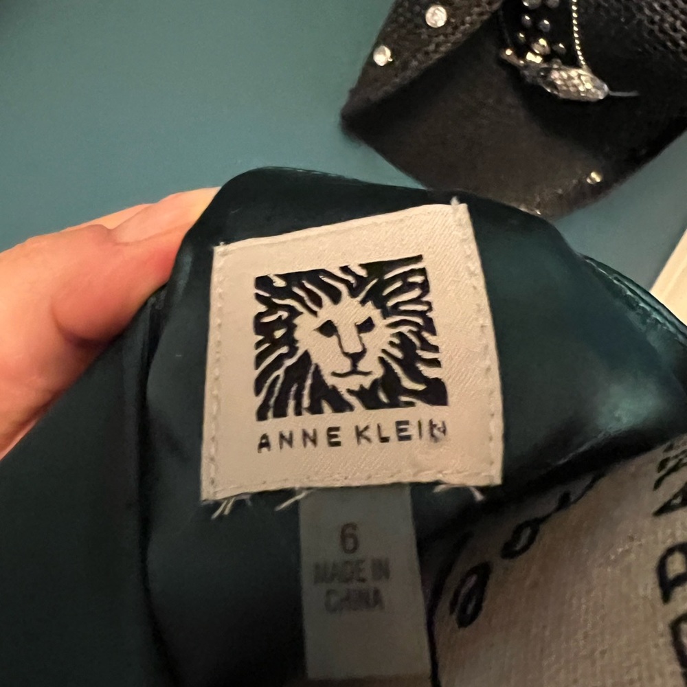 Size 6, emerald green satin dress with tie empire waist.